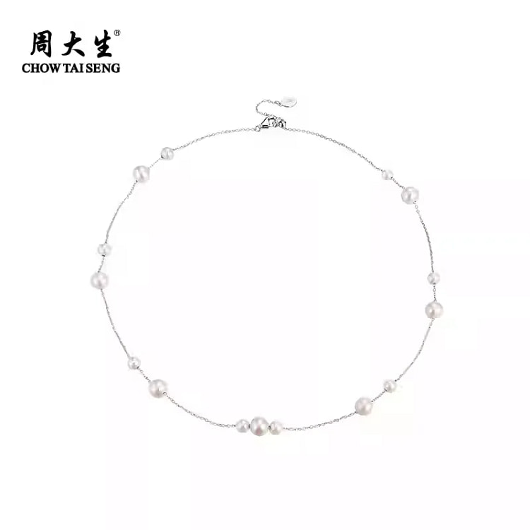 Zhou Dasheng wears two starry pearl necklaces