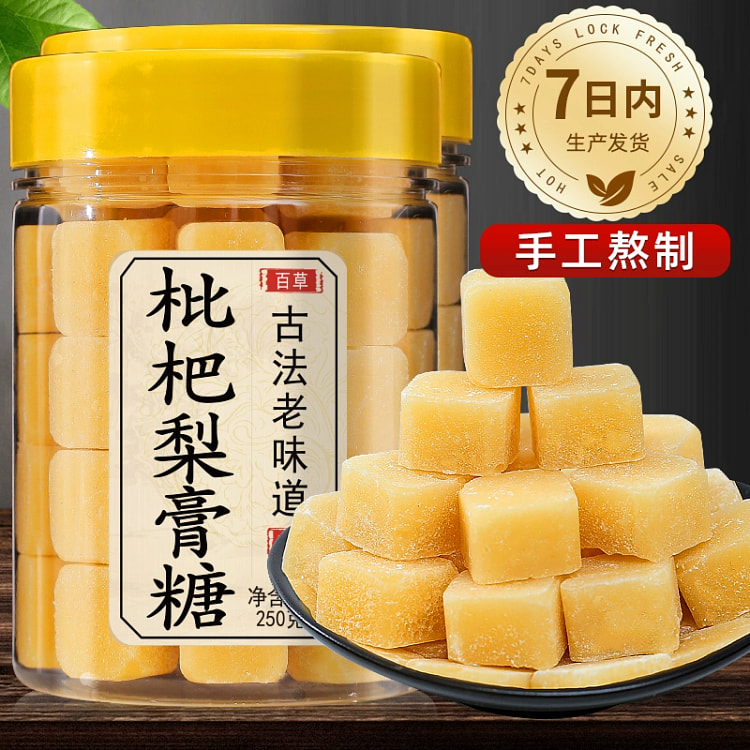 Loquat pear paste candy is handmade by ancient method of boiling water and 