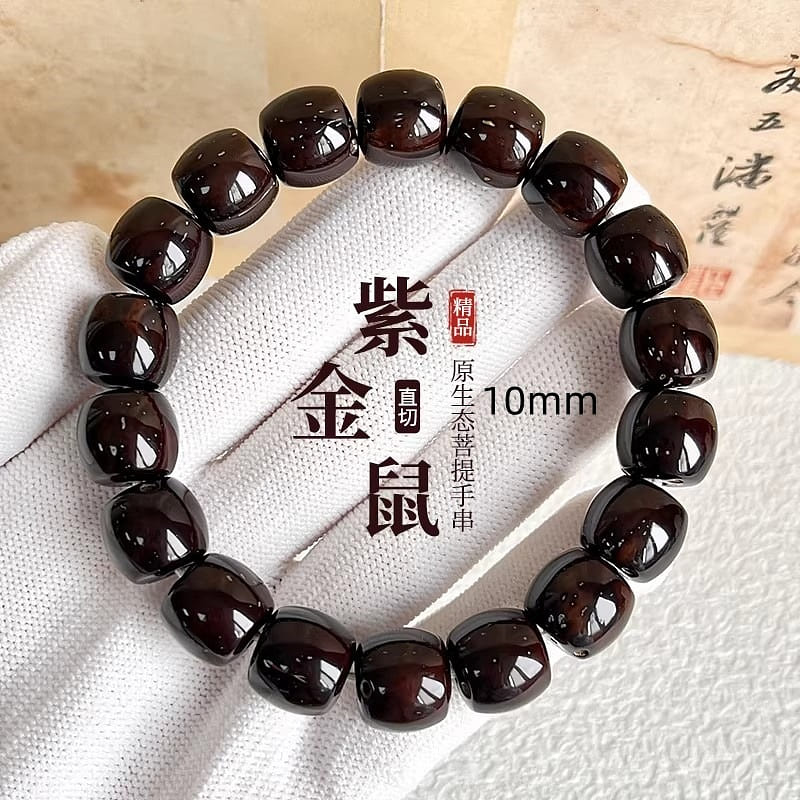 One straight-cut purple and gold rat Bodhi bracele 1 each