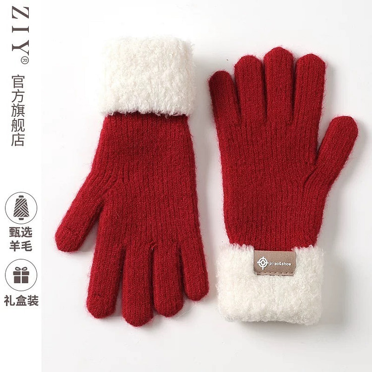 Wool gloves knitted in red for New Year gift and personal use