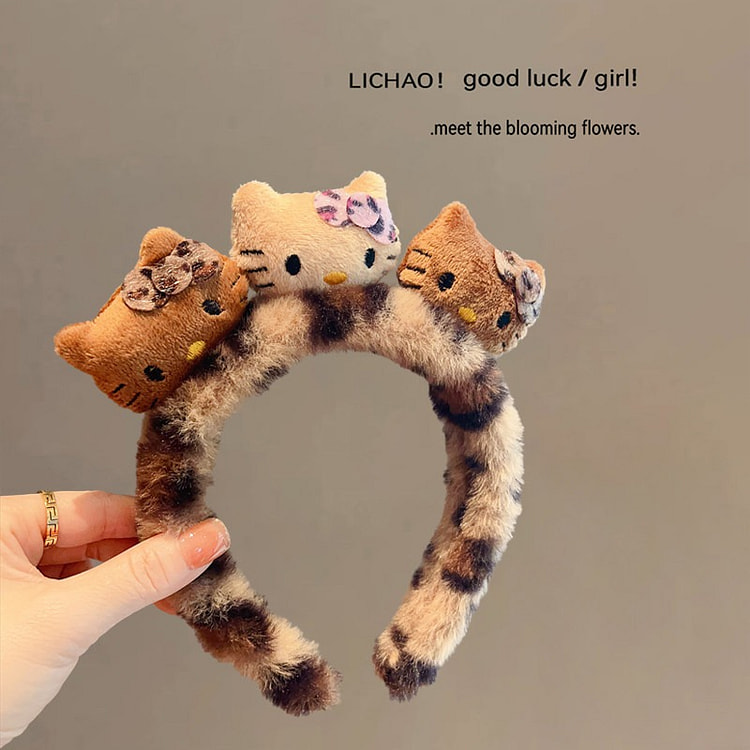 Leopard print kitty headband, plush hair band 1 count