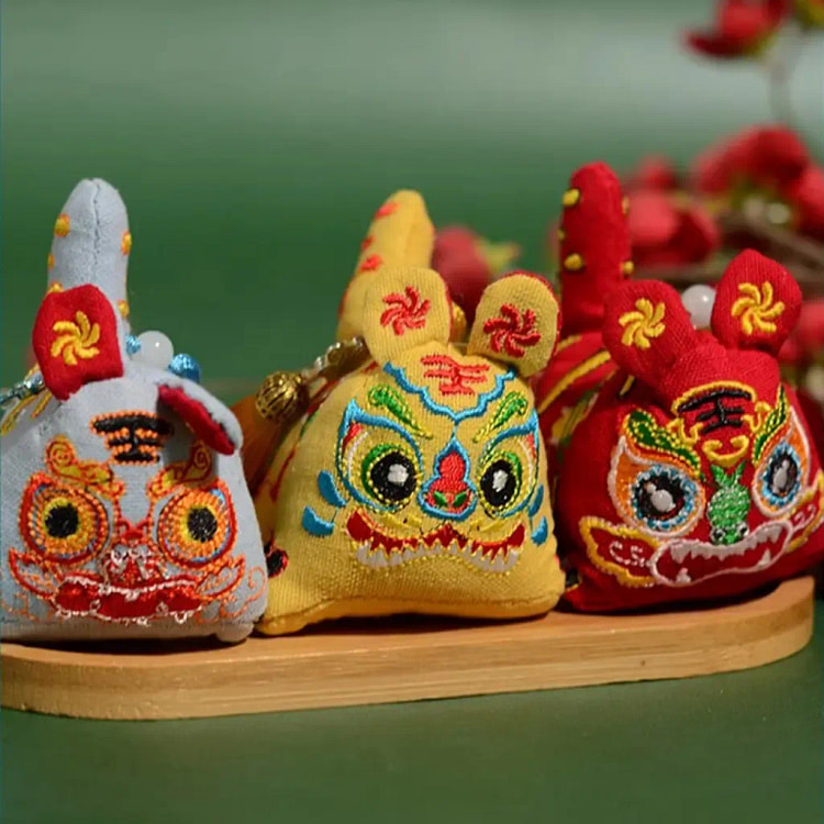 A light blue cloth tiger sachet pendant 1 each