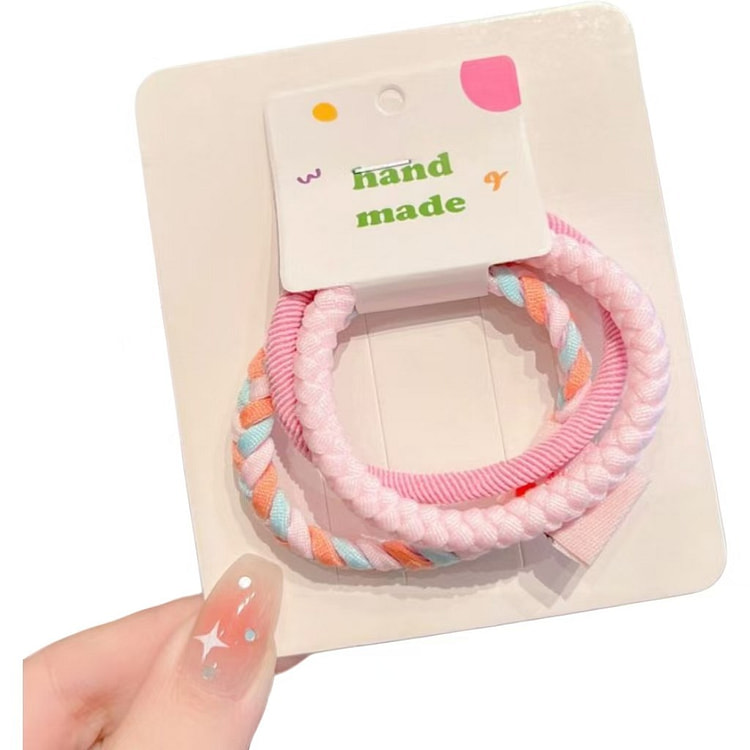 One pink hair tie 1 each