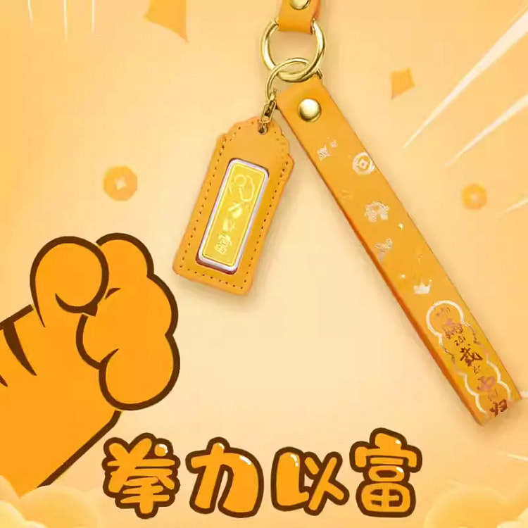 Chow Tai Fook's Fist Power Rich Keychain