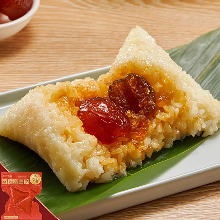 2 glutinous rice dumplings with fragrant candied d