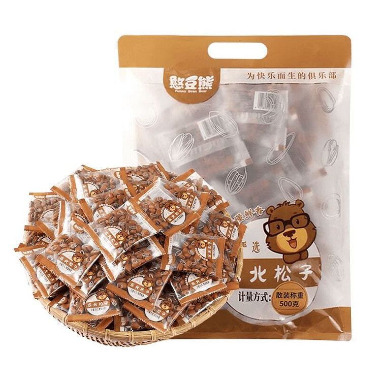 The clumsy bear is shelling and eating pine nuts. 500 g